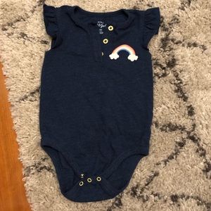 Navy blue furrow sleeved rainbow onesie